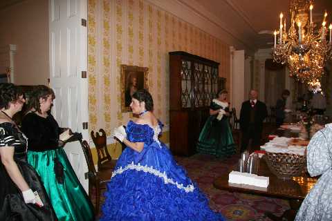 Ladies discuss who will dance what dance and with whom.